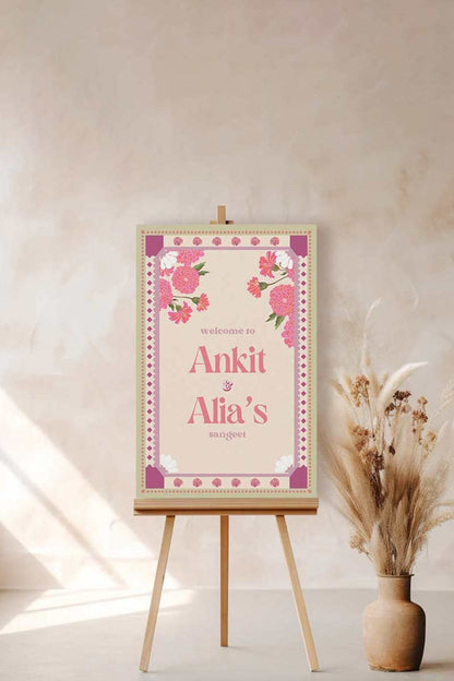 Pink & Purple Retro Wedding Welcome Sign with pink marigold florals. Pastel colours. Indian Wedding events for Sangeet, Haldi, Maiyan or Jago. Wedding Signage. Personalize and customize in Canva. Digital Download.  Print around the world at a local print shop.