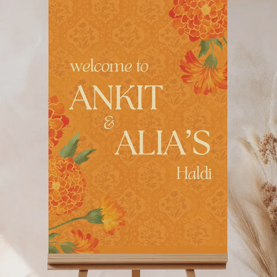 Floral Wedding Welcome Sign. Event Welcome Sign. Shades of Orange and yellow. Orange magnolio florals. Baby Shower. Indian Wedding. Birthday and Celebration. Engagement Stationery. Wedding Stationery. DIY Stationery. Digital Download. Canva. Indian Weddings. Reception. Personalize. Customize. Anand Karaj, Mehndi, Sangeet, Haldi