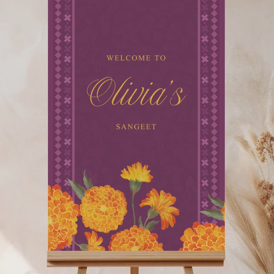 Wedding Welcome Sign with marigold florals in the shades of purple, yellow, & orange. phulkari. Indian Wedding Events like jago, sangeet, mehndi, haldi, chunni & maiyan. Personalize and customize in Canva. Print at any local printer around the World.