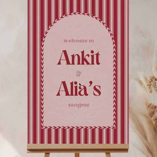 Jaipur block print Welcome Sign with arched stripes and chevron pattern in the shades of red, pink, and beige. Indian Wedding Events like jago, sangeet, mehndi, haldi, chunni & maiyan. Inspired by Villa Palladio Jaipur. Palace Arches. Traditional and modern indian design. Personalize and customize in Canva. Print at any local printer around the World.