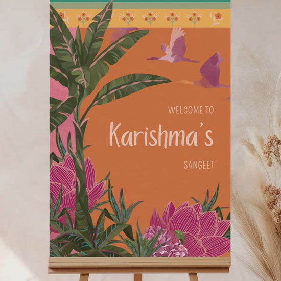 Tropical Jungle & Palm Tree Wedding Welcome Sign. In the shades of pink, hot pink, green, teal, orange, yellow, forest green & beige. Tropical Jungle theme event. Indian Wedding Events like engagement, baby shower, bridal shower, birthday, jago, sangeet, mehndi, haldi, wedding & maiyan. Personalize and customize in Canva. Print at any local printer around the World.