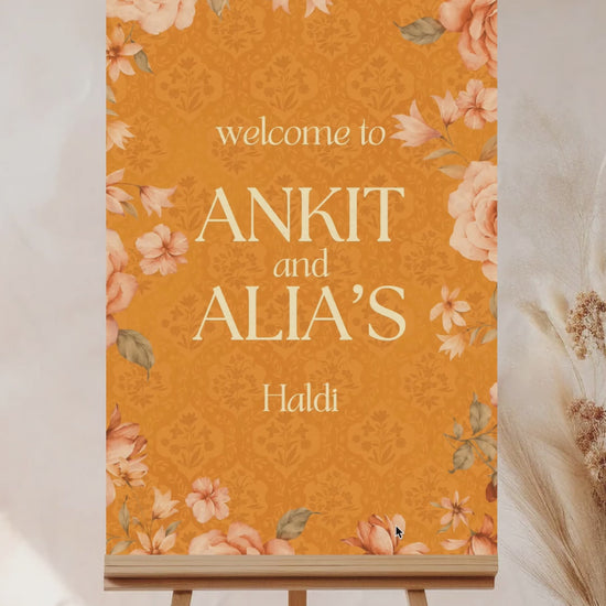 Floral Wedding Welcome Sign. Event Welcome Sign. Shades of Orange and yellow. Orange roses. Baby Shower. Indian Wedding. Birthday and Celebration. Engagement Stationery. Wedding Stationery. DIY Stationery. Digital Download. Canva. Indian Weddings. Reception. Personalize. Customize. Anand Karaj, Mehndi, Sangeet, Haldi