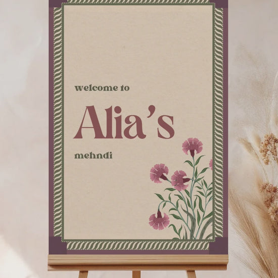 Retro Jaipur block print Welcome Sign with florals in the shades of purple, green, and beige. Indian Wedding Events like jago, sangeet, mehndi, haldi, chunni & maiyan. Personalize and customize in Canva. Print at any local printer around the World.